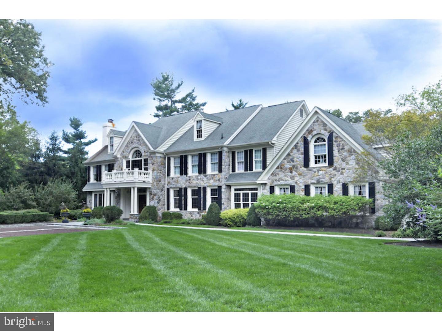Exquisite 6 Bedroom, Sweeney built, Custom Stone and Cedar Colonial with Finished Basement and gorgeous heated salt water Pool with waterfall and raised Hot Tub, quietly situated deep within a cul-de-sac, down a long private drive on an outstanding, lushly landscaped 1.32 acre lot, providing the ultimate in privacy yet enjoying the advantages of its location within a highly coveted Gwynedd Valley neighborhood. This meticulously maintained and beautifully updated home with vaulted and 9' ceilings, offers the finest in architectural details including custom millwork, hardwood floors, custom built-ins and French doors leading from one room to the next, providing the perfect entertaining flow. The vaulted 2-story entrance hall provides 3 sets of French doors opening to the Living, Dining and Great Rooms. The Living Room includes one of 2 propane gas fireplaces and the 1st of multiple included flat screen TVs. A chef's dream Kitchen was updated in 2016 and features a center island, granite counters, stainless appliances including 2 dishwashers and 2 ovens and is open to the sun-drenched Breakfast Room with 4 skylights, overlooking the lovely grounds. The incredibly spacious 2-story Great Room offers a floor-to-ceiling stone propane gas fireplace, wet bar and entertainment center with TV. The 1st floor Office with 2nd wet bar and entertainment center is adjacent to a full bath, creating the option for a 1st floor In-Law Suite. 2 sets of stairs provide access to the 2nd floor. The outstanding Master Suite features an extra-large, professionally organized walk-in closet plus an upgraded full bath with corian counters & shower with frameless glass door. 5 additional bedrooms and 3 full baths complete the 2nd floor. The finished Lower Level offers an additional 1840 sq.ft. including a fabulous Recreation Room, 2nd Office or Bedroom, and a Gym. French doors from multiple 1st floor rooms open to a deck and the sensational multi-tiered flagstone patio overlooking the exciting black-bottom, salt water Pool, gracefully surrounded by mature specimen trees and shrubs accented by low stone walls. Newer HVAC and boiler. Located minutes from the Gwynedd Valley train station providing easy access to center city, plus close to excellent shopping and restaurants. The highly desirable Wissahickon School District was recently rated #1 in state test scores. 1 Year Home Warranty included. Paradise in Gwynedd Valley!