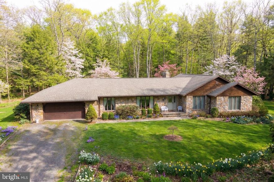 Set on more than 4 scenic acres just outside of Bittinger, this solid stone ranch offers incredible potential in one of Northern Garrett County’s most desirable locations. Structurally sound and built to last, the home provides a fantastic opportunity to create something truly special with interior updates. With a little vision—and something as simple as new flooring—the space could be completely transformed into a warm and inviting country retreat. The main level offers convenient one-level living with three bedrooms and the easy capability to create a fourth bedroom if desired. A fully finished basement adds significant additional living space, perfect for recreation, entertaining, or guest accommodations. The attached heated two-car garage provides year-round comfort and practicality. Surrounded by open space and peaceful countryside, the property offers privacy while still being conveniently located just minutes from local amenities and within easy reach of Deep Creek Lake and the surrounding recreation. Whether you're looking for a full-time residence, investment opportunity, or a home to renovate and make your own, this property presents a rare chance to own acreage, durability, and potential in a highly sought-after area of Garrett County.