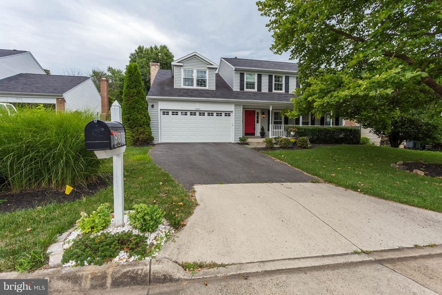 Beautifully updated throughout. New Roof &gutters, Huge pantry. Granite CT. Hrdwd floors. All finishes updated (door knobs, lighting, etc.), bathrooms, kitchen, modern/neutral paint, crown molding, new windows, GAS range! Large WIC in most bedrooms upstairs. Newer HVAC & water heater, upstairs laundry. Spacious basement w/ in-law suite with WIC, full bath, & wet bar. Located on a quiet cul-de-sac