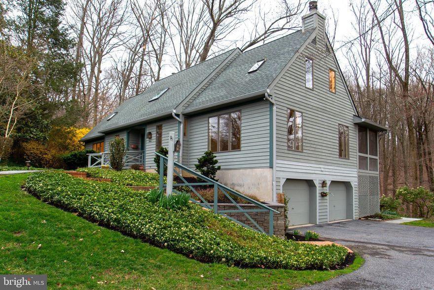 Wow!!! Must see 2720 sq. ft. above grade and 800 sq. ft. below grade, 3 bedroom 4.5 bathroom home on 5.37 acres. House backs to woods with a stream,  for complete privacy. The long paved driveway adds to the privacy of the home.  This home boasts a two story open foyer, large great room, laundry/pantry off the kitchen, first floor primary bedroom/bathroom, 2 bedrooms upstairs and a recently added apartment in the lower level.
The entire interior of the house was just painted and new carpet was installed on the upper level. Most windows are Anderson casement, two zoned air conditioning, built in speakers throughout and a burglar and fire alarm system.
There is a large deck & screened in porch for you to relax on or enjoy with company. There is an over sized  attached 2 car garage and large  beautiful landscaped perennial garden in the front yard. For a fee there is a community pool and a view of the nearby golf course.