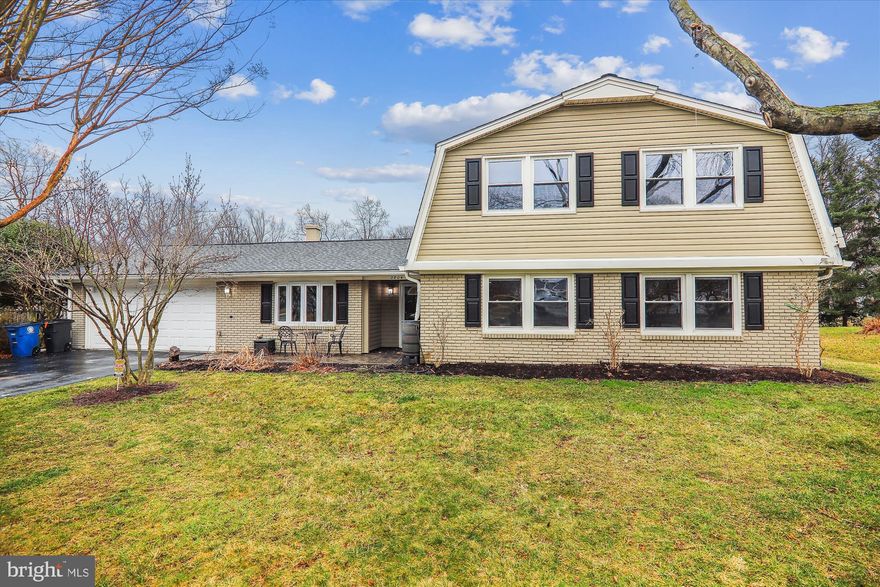 Sellers have put their heart and soul into this home starting with the beautiful renovated kitchen with stainless appliances and a breakfast bar. Kitchen opens to the family room that has a wood burning fireplace and travertine stone hearth. The entire first level has water resistant durable porcelain floors, except there is laminate floors in the sunroom. Formal dining room with crown and chair molding, living room has recessed lighting. There is a first floor bedroom adjacent to a renovated full bath with easy glide shower door and comfort height sink. Primary bedroom, on upper level, has a walk-in closet with an Elfa system, renovated full bath with comfort height twin sinks, heated towel bars, custom ceramic tile shower and floor. Two additional bedrooms with ceiling fans, a hall full bath and a linen closet. There is attic access in the hallway with a folding pull down ladder.  Roof, gutters, windows, 200-amp electrical box, and HVAC have been replaced in 2017. EV Charging outlet in garage, two rain barrels and flood lights around the perimeter. Located in a pool and tennis community, near Matthew Henson hiker biker trail and Metro.