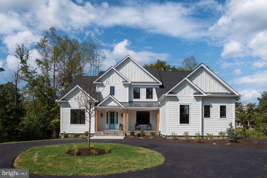 To Be Built/New Construction.  

Discover refined living in The Walnut Grove, a signature residence by Simply Home, beautifully positioned on 3.9 private acres with an impressive 211-foot setback from the road. Offering 5,332 finished square feet, this thoughtfully designed 5-bedroom, 5-bath home with a 3 car garage blends timeless architecture with modern comfort.

From the moment you arrive, the home’s presence is undeniable. Timeless Hardie Plank siding, refined architectural lines, and thoughtfully designed exterior detailing create a striking yet elegant façade. Step inside to experience a seamless blend of sophistication, openness, and purposeful design that defines luxury living at its finest.

The heart of the home begins with a dramatic two-story foyer that makes an unforgettable first impression, leading into the soaring two-story living room filled with natural light. Designed for both elegance and comfort, this stunning space flows effortlessly into the gourmet kitchen and breakfast area. The kitchen is thoughtfully crafted for entertaining and everyday living, featuring premium finishes, a generous center island, and direct access to the screened porch and deck, perfect for seamless indoor-outdoor living

The main-level Owner’s Suite is a private retreat, complete with a spacious walk-in closet and a spa-inspired bath featuring a freestanding soaking tub, dual vanities, and an oversized shower. A private library offers the ideal space for a home office or quiet reading room, while the formal dining area and well-appointed laundry room complete the main level.

Upstairs, 4 generously sized bedrooms and 3 beautifully designed bathrooms provide comfort, privacy, and flexibility for family and guests.

The walkout lower level will feature a finished recreation room, creating additional living and entertaining space, with options available to add a bedroom, full bathroom, media room/home gym, allowing you to tailor the home to your lifestyle needs.

Set on over 3.9 acres of privacy with Simply Home’s signature craftsmanship and attention to detail throughout, The Walnut Grove offers an exceptional opportunity to build a home that truly stands apart.

Prices and options are subject to change without notice. Photos are for illustrative purposes. (Walnut Grove Model)