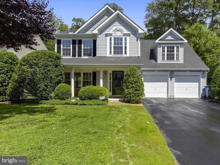 WOW!! New BARGAIN Price!  LOCATION, LOCATION, LOCATION... Here it is!! YOUR Rare Opportunity to Own this Move-In-Ready KENT ISLAND Colonial Home! Backing to the Woods in the Desired Neighborhood of MALLARD RUN, this Beauty is Complete with sprawling Covered Front Porch, 4BR, 2.5BA & Over 2700 SQFT w/ALL the Bump Outs! Very Well Maintained Home- just add your own touches! TWO Car Garage has Pull Down Attic & BONUS Office Space with Heat & Air! The FULL Sunroom offers natural light & Palladian Windows along with a 4 seat Kitchen Bar! Large, open Kitchen w/Island & Huge Pantry! Cathedral & 9'+ Ceilings throughout & NEW Professional Paint in all rooms!  Whole House Vacuum system for easy clean up & Separate Laundry Room with Mud Tub & shelving! Backyard has Patio & a custom 2 story Shed with Electric! (Backyard extends well into the wooded area) Walk to TOP RATED Schools, Library, Trail, Parks & Sports Fields! Mallard Run Community has Boat/RV Storage, Trash Removal, Recycling, Sidewalks, Street Lights  & access to the Kent Island Trail! Come enjoy living in this lovely planned development.. easy to make wonderful memories here!! Public Water & Sewer too!