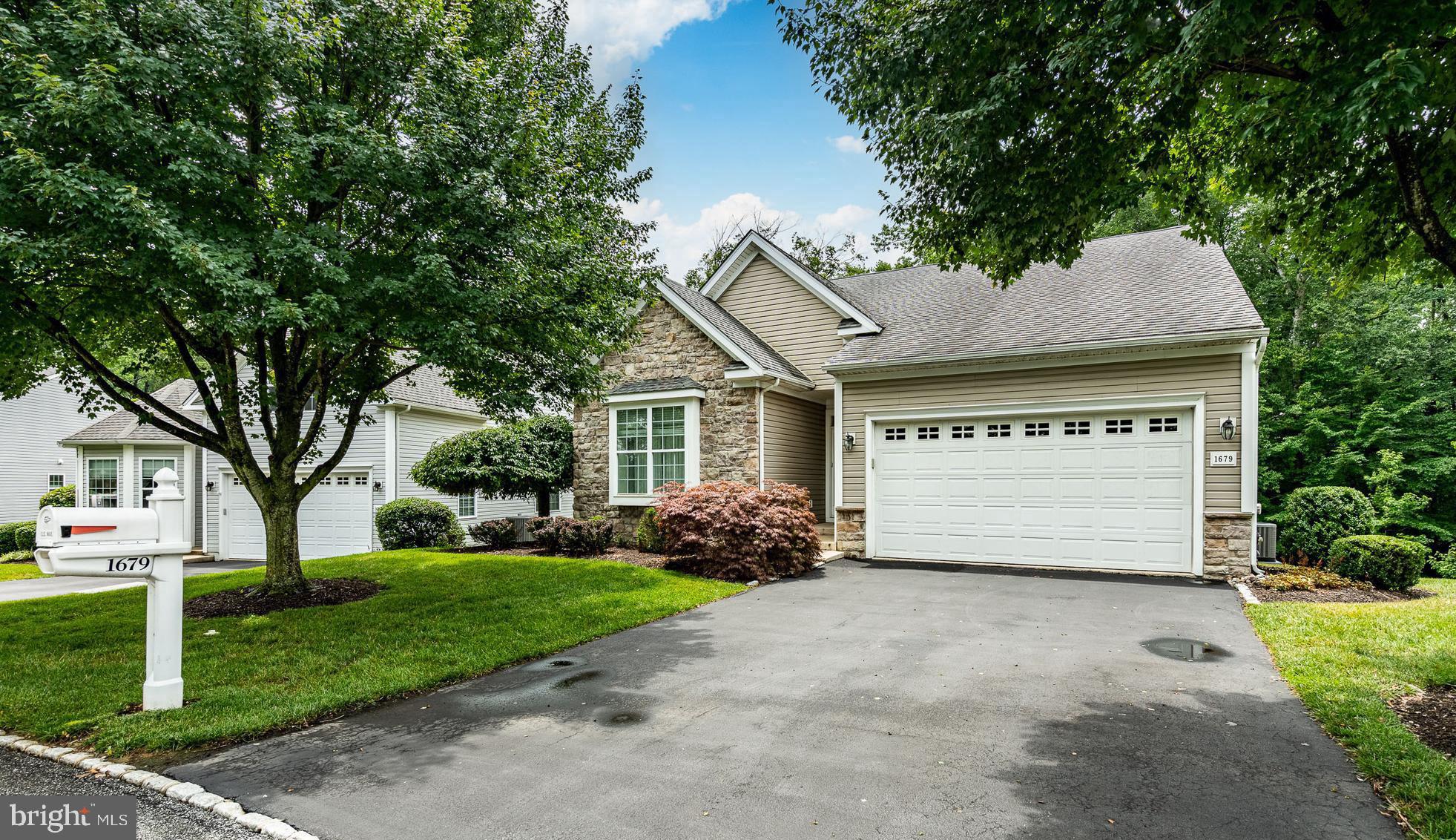 Welcome to 1679 Village Ave – A Serene Retreat in the Heart of Foxfield’s 55+ Community. Tucked away in the highly sought-after Foxfield neighborhood, this charming Booth model backs to complete privacy, surrounded by mature trees and peaceful views. Offering 2 bedrooms, 2 full bathrooms, and a finished walk-out basement, this home has been thoughtfully maintained and features a new HVAC system with UV air scrubber and humidifier for year-round comfort. Step inside to find hardwood flooring throughout the foyer, dining, and living rooms, complemented by elegant crown molding. Oversized windows with transoms frame picturesque wooded views, creating a cozy, natural backdrop visible from many rooms. The kitchen is both functional and inviting, featuring 42” cabinets with glass accents, gas cooking, a pantry, peninsula seating, and an eat-in area that opens to the living room with a gas fireplace. Step through sliding doors to a screened-in porch, the perfect spot to enjoy your morning coffee or unwind with the sounds of nature. The spacious primary suite on the main level includes two large closets and a private en suite bath. A second bedroom, full hall bathroom, convenient laundry room, and access to the 2-car garage complete this ideal one-level living setup. Downstairs, the daylight walk-out basement is impressively large, offering flexible space for hobbies, guests, or recreation—plus plenty of storage. Foxfield’s lifestyle amenities are second to none, including: Fitness center & library, Resistance pool & billiards room, Tennis/pickleball, bocce, shuffleboard, and corn hole courts, 6-hole golf course, Community pool & social clubhouse, Craft room and a vibrant calendar of events and trips. Your monthly HOA fee covers lawn care, snow removal, roof repair/replacement, driveway seal coating, and trash—providing a truly low-maintenance lifestyle. Perfectly located near major highways and shopping in both PA and DE, this home isn’t just a place to live—it’s a place to thrive.
Schedule your private showing today and discover the Foxfield lifestyle.