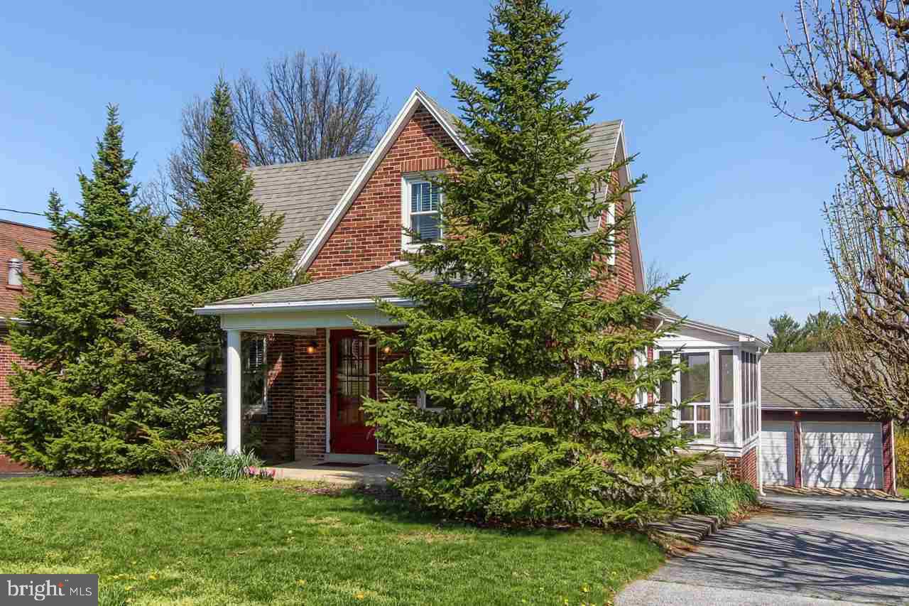 Amazing brick cape cod with great natural woodwork inside...huge living room and dining room. First floor hosts an updated bathroom and 2 of the bedrooms. The final bedrooms are on the second floor as well as loads of storage. The basement is concrete and ready for a rec room. Additionally there is a full bath, storage, utility room & laundry area. Vinyl replacement windows. Home has a black bear shed and a detached 2 car gar. with 2 doors.