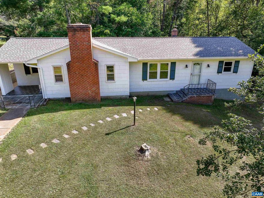 Renovated home on nearly 3 quiet acres in Keswick! Minutes from popular wineries with great bones. New roof, new HVAC and mini-split and remodeled kitchen and bathroom are just some of the major updates. New LVT flooring in the living room and kitchen are low maintenance and easy to keep clean. New kitchen features solid oak cabinets, granite countertops, and high-end LG stainless steel appliances. Dine at the breakfast bar! Gather with friends at the dining room table, or around the brick wood-burning fire place in the cozy den.  Working from home is a breeze in the private study with high-speed, fiber-optic internet. The spacious primary bedroom features a brand new bathroom with jetted tub, new toilet and vanity.  Access the large deck from either the kitchen or primary bedroom and enjoy a morning cup of coffee in the sunshine.  Unfinished basement features a new washer and dryer, shower stall and access to the yard.  A detached three-car garage/barn includes space for a workshop and outdoor tools and equipment.,Granite Counter,Wood Cabinets,Fireplace in Basement,Fireplace in Den