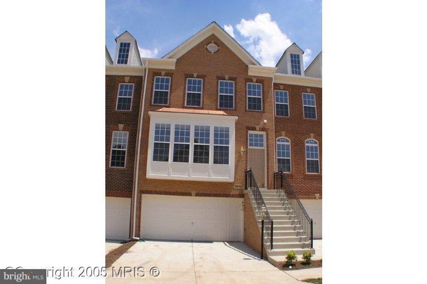 Newly Renovated! All three levels above grand! GORGEOUS NEW LUXURY TOWNHOME IN SOUGHT AFTER SULLY MANOR -  Brick Front w/Box Window, Foyer Entry, Huge Country Kitchen w/Island & Adjoining Fam Rm, Large MBR & Luxury MBA, W/D on BR Level, Fin Bsmnt w/Full BA, Gas FP, 2 Car Garage w/Ample Room for Storage & so much more to Mention!