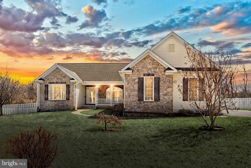 Welcome to this expansive rancher that perfectly blends elegance, comfort, and functionality—all nestled on over an acre in a prime location. Boasting four bedrooms and three full baths, this home offers one-level living with a thoughtfully designed layout and a fully finished basement. Step inside to discover a large kitchen featuring an island, breakfast area, abundant cabinetry, Corian countertops, and a stylish tile backsplash. The formal dining room exudes charm with hardwood flooring, a tray ceiling, and chair rail detailing, making it the perfect setting for gatherings. The living room is a showstopper, featuring a cathedral ceiling, a cozy gas fireplace, and a slider leading to an expansive composite deck—ideal for entertaining or enjoying serene backyard views. The primary suite is a retreat in itself, offering two walk-in closets and a spacious en-suite bathroom. Two additional bedrooms on the main level provide ample space, while the fourth bedroom is located in the finished basement, complete with a full bath. The lower level presents endless possibilities with two additional finished rooms—perfect for a home office, craft room, or gym—along with a workshop area and rough-in for a fourth bathroom. Outside, enjoy the privacy of a vinyl-fenced yard and the convenience of an oversized three-car garage. With its perfect blend of space, style, and practicality, this home is a must-see! Schedule your tour today and experience all this incredible property has to offer!