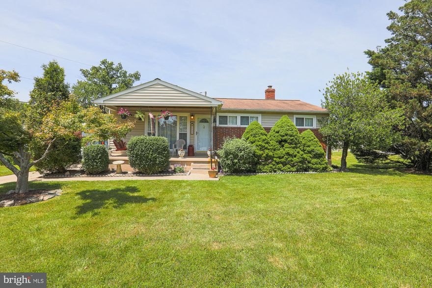 COZY 3 Bedroom 1.5 Bath Rancher on a corner lot in Parkville * Features Include: SPACIOUS living room * Hardwood floors * IMMACULATELY kept throughout * THREE bedrooms and one FULL bath complete the main level * On the LOWER level you will find a  family room with BAR , HALF bath and utility area * LARGE fenced yard * MULTIPLE car driveway * A great home and a MUST see!