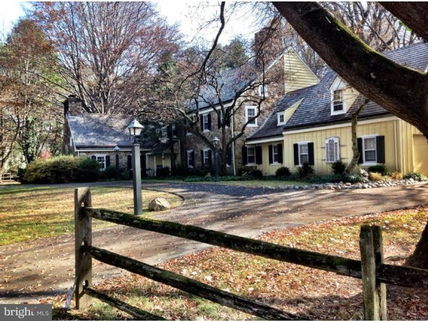 Most charming stone farmhouse built under the architectural direction of "Okie", offers five generous bedrooms and 5.5 baths on a flat and truly picturesque 2.03 acre parcel just minutes from Philadelphia's center. Three extraordinary fireplaces, wide planked floors detailed iron hinges highlight the homes generous formal and informal spaces.  A covered porch joins the Living Room to the Dr maximizing the enjoyment of the rear yard and providing seamless flow for entertaining on grand or intimate scale. Separate entrance to one of the homes bedrooms, currently purposed as an in home office, allows for private meeting spaces away from busy family life.