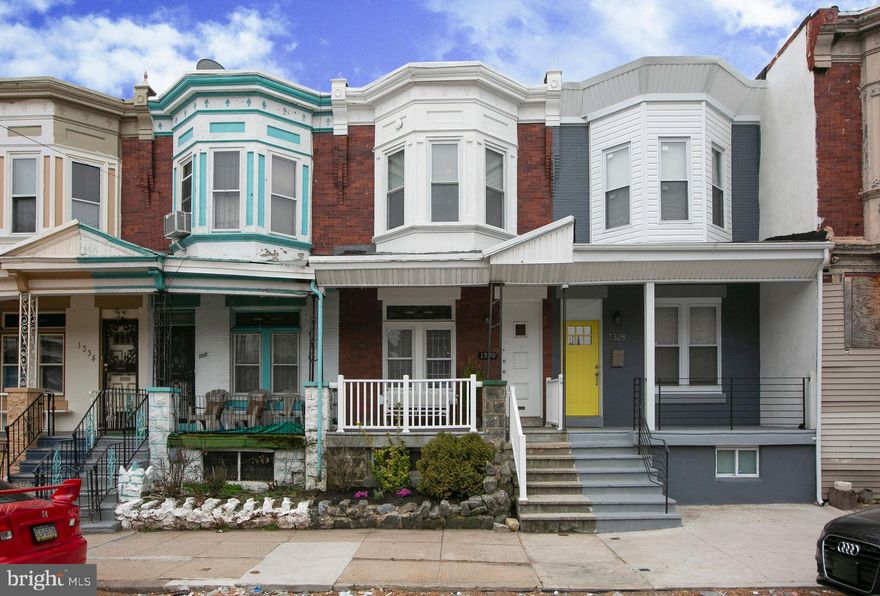 Beautiful renovated 3 bedroom, 1.5 bathroom home in the popular Kingsessing neighborhood! This home features new hardwood floors, recessed lighting throughout, a completely updated kitchen with modern appliances to boot, and all new electric and plumbing! The charming front porch leads you through an entryway vestibule into the spacious open-concept main floor. Comfortably laid out, you have plenty of space for large living area furniture, a dining table and more. The main floor has a powder room, as well as access to the yard and large basement, which is equipped with a brand new washer/dryer. Heading upstairs to the second level, the large master bedroom boasts beautiful bay windows that keep the space bright and airy. The main bathroom is equipped with a relaxing jacuzzi tub, and the other 2 bedrooms are generously sized. Located just minutes from University City, a short commute to Center City.  Close to public transit lines,  and local highways.  Kingsessing itself also has loads to offer with easy access to the Kingsessing library, park, recreation center and pool. This property is zoned CMX2 AND falls within the boundaries of PENN PHOS forgiveable loan program!