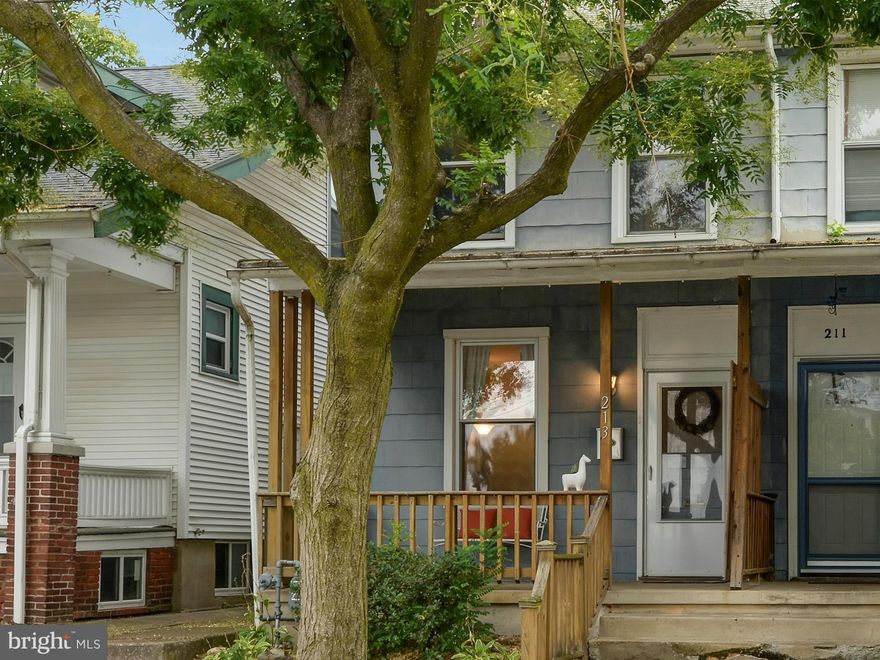 This adorable move-in ready home is spacious and filled with natural light. Enjoy living room, dining room, large eat-in kitchen with pantry and chair rail and first floor laundry / utility room.  Home features a  front porch, 4 large bedrooms, updated bathroom, rear porch off master bedroom overlooking fenced-in yard with shed and both on and off-street parking.  Home is just down the street from the community pool. Home warranty included.