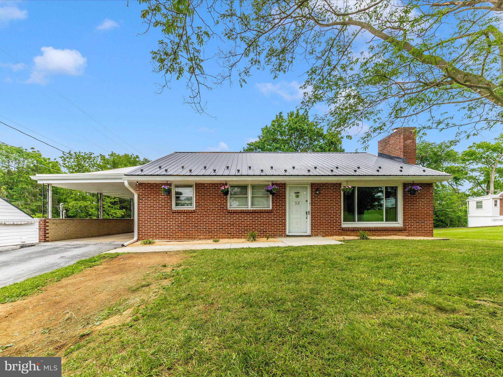 ** MOTIVATED SELLERS** Sellers are relocating internationally! Don’t miss this great deal! Bring us an offer!
Welcome home! This brick rancher offers 3 nice size bedrooms, large living room with beautiful hardwood floors and stunning fireplace. Look no further as this conveniently located brick rancher has recent upgrades such as a new slate roof, gutters, and under slab sewer line replacement in 2024! NO CITY TAXES! Just minutes away from interstate 70, this is a commuters dream! This home has tons of storage and potential with over 1200 square feet of living space on the main level. Easy to show and priced to sell!!!!
