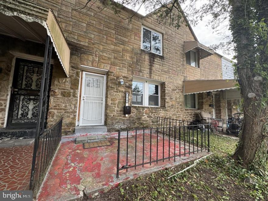 Spacious all brick townhome in convenient location. Open main level floor plan with hardwood flooring. The home features a huge backyard. Plenty of street parking and great access via the rear alley. Finished basement.