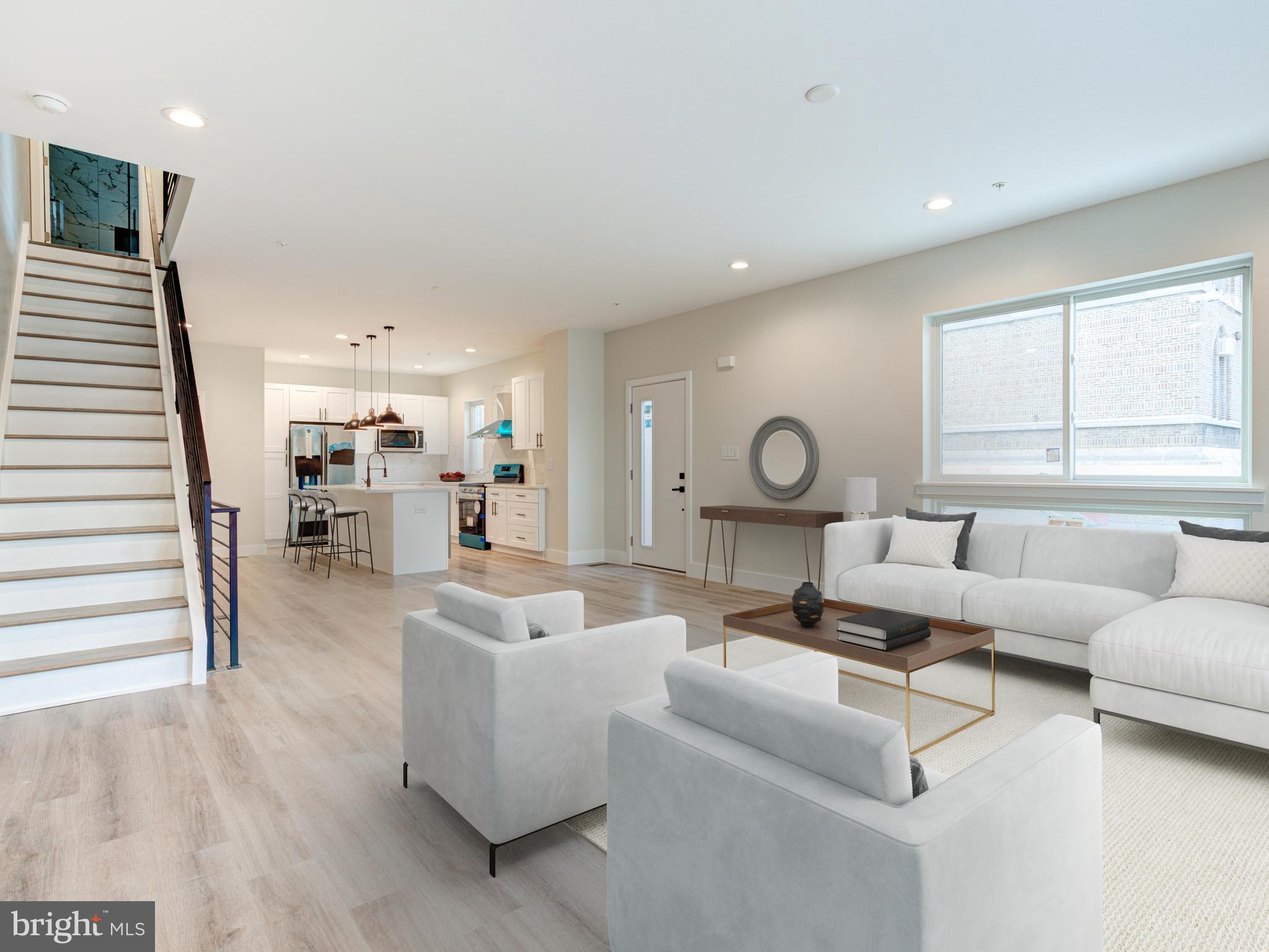 I am excited to share an incredible opportunity in one of Fishtown's most sought-after locations, at Berks and Moyer! This new construction home is a stone's throw from the vibrant activity on Girard Ave and close to the best restaurants on Frankford Ave. This stunning, contemporary home offers a 10-year tax abatement and features a modern, expansive layout on every floor, thanks to its 19-foot depth. Enjoy luxury finishes and a fantastic lifestyle in this rapidly growing neighborhood. Plus, it comes with a 1-year builder's warranty for added peace of mind. The first floor boasts a super-wide open living room, high ceilings, and abundant natural light—perfect for entertaining. The culinary kitchen is equipped with quartz countertops, custom high-end cabinetry, and a top-of-the-line appliance package. A rear yard with a custom patio provides a great space for BBQs or pets. The finished basement, complete with a full bath, offers additional square footage for entertainment and storage. The second floor features a well-thought-out layout with three bedrooms, a full bath, and a tub. Each bedroom has ample closet space, making it ideal for a home office. On the third floor, you'll find a private, deluxe master suite with a HUGE walk-in closet and a spa-like luxury bath, filled with natural light and custom tiling. Hardwood flooring extends throughout the home. The roof deck offers expansive views of the city, including the bridge and downtown—perfect for entertaining or relaxing. With dimensions of 19 x 40, this spacious home is truly exceptional. Additionally, the absence of homes across the street enhances parking options. 630 Moyer is an incredibly built home with meticulous attention to detail at every level. Please note that the photos are of 632 Moyer. The property is complete, vacant, and easy to show! Schedule your visit today.