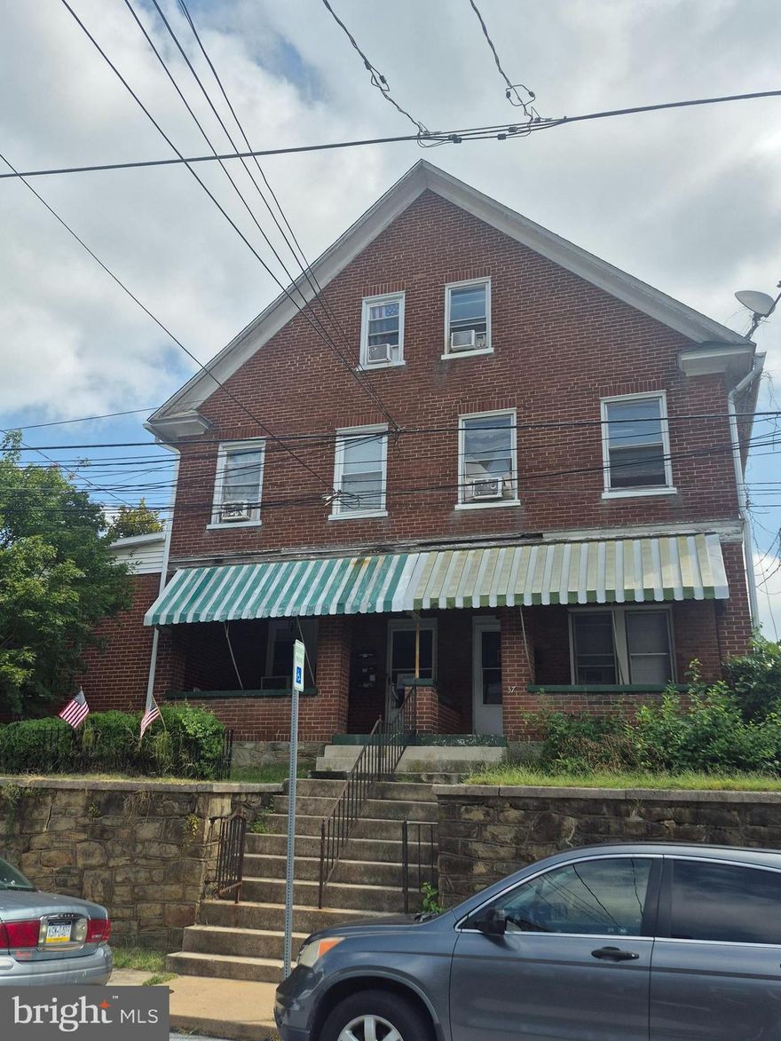Investment opportunity. Fully occupied 3-unit in Coatesville. Small garage in need of repairs for additional income.