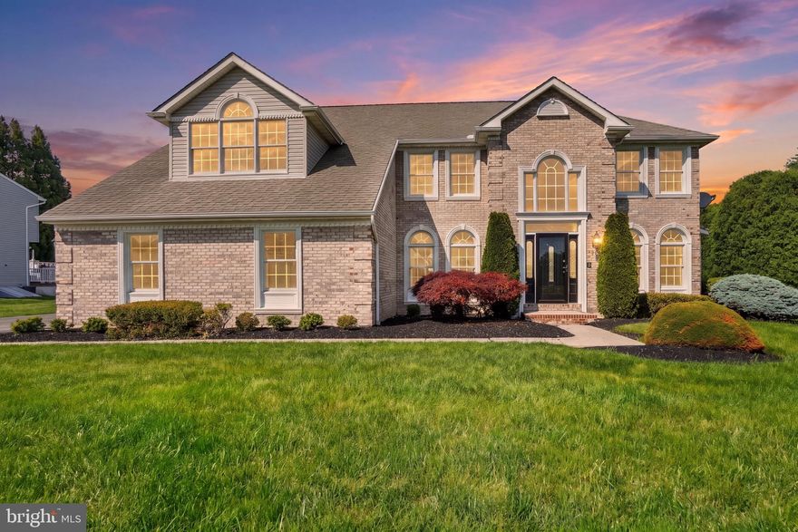 Welcome to this beautifully maintained brick home situated on a quiet cul-de-sac, offering impressive space, quality construction, and thoughtful updates throughout. A grand two-story foyer welcomes you into the home and opens to the dramatic two-story family room featuring a striking brick gas fireplace and abundant natural light. A private first-floor office offers flexible space for work or everyday living..  The gourmet kitchen is ideal for entertaining with granite countertops, new appliances, and ample cabinetry, flowing seamlessly into the main living areas. Step outside to a huge brick patio overlooking the private, spacious yard.  Side load oversized garage and driveway for plenty of parking.  Expansive primary en-suite offers vaulted ceilings, double-door entry, a sitting area, walk-in closet, and luxury bath with double sinks, soaking tub, and separate shower. Recent updates include new luxury vinyl plank flooring, new carpet, fresh paint, updated lighting and fixtures throughout, all new toilets, and new garage door openers.  Lower level adds excellent potential, already featuring a full bathroom and rear walk-up access through Bilco doors, making it ready to finish for additional living space, recreation, or guest use.  Immaculately maintained and offering the kind of craftsmanship and layout that’s increasingly hard to find, this is a standout opportunity.