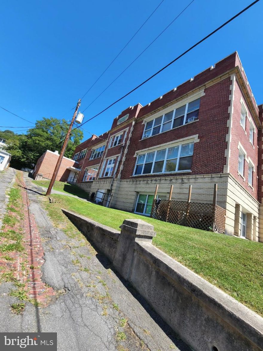 2 bed 1 bath apartment for rent in the newly renovated Columbia St School! , private parking, water, sewer, trash, hot water included.   Coin opp laundry on-site. Agent Owner, call today, move tomorrow!