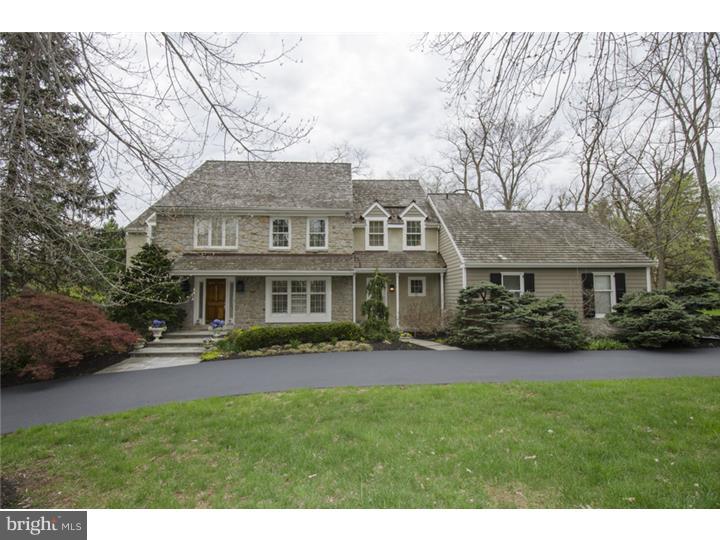 A sweeping circular drive welcomes you to this very special 4 bedroom, 4.1 bath home. Well appointed, special features include refinished hardwood flooring, an open foyer, formal living and dining rooms, living room has a fireplace with marble surround and French doors on either side to rear deck, a first floor office, an inviting family room with fireplace, custom built-ins, and direct access to the rear deck, an updated kitchen with granite counter tops and stainless appliances, a breakfast room with sliders offering direct access to side deck, a fabulous master suite with custom outfitted closet and marble bath, a fabulous walk-out lower level with a full bath. This sophisticated, well appointed and well maintained, home is situated on a magnificent picturesque lot, in the heart of Ravenscliff, a community that is well know and appreciated for scenic surroundings. The open floor plan and light filled rooms make this the perfect home for gracious entertaining, as well as, comfortable family living. It offers easy access to major highways and is serviced by the award winning Radnor School District. Seller is a licensed PA Real Estate agent.