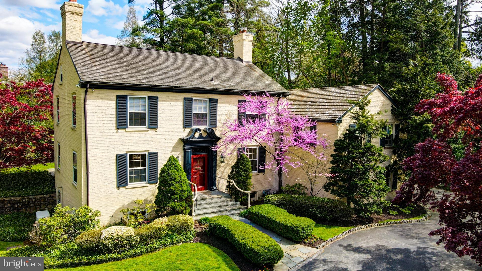 Welcome to this beautiful Walter Durham Classic. Located in the heart of Haverford within steps of Merion Cricket Club, this gorgeous home is one to be cherished forever. A Georgian Colonial with all the Durham details awaits a new homeowner to enjoy every corner of this special property. The bucolic setting offers a quiet, serene property with landscaped gardens, circular drive, rolling lawn and calming sunsets. Entertain with delight on the fieldstone patio off the Living Room with a look at the unique architectural exterior lines of this home. This home features a traditional floor plan offering a Living Room running front to back with fireplace, built-ins and recessed lighting with sundrenched windows overlooking a luscious lawn just awaiting your garden design. The Dining Room just off the Living Room and opening to the Kitchen/Family Room is perfect for entertaining and again offers simply gorgeous windows with views of the gardens. The Expanded Kitchen/Family Room area provides a Brick Fireplace, Oversized Working Island, Custom Cabinetry with Built-in Sub Zero, Viking Professional Range with Double Ovens and so much more. A traditional Butler's Pantry and Telephone Room with Formal Powder Room just steps from the Kitchen lead to the Formal, yet inviting Foyer. The Second Level provides a lovely Primary Suite overlooking the back gardens, Marble Bath w/Soaking Tub & Stall Shower and Spacious Closets; just off Primary is a Nursery or Office conveniently located and lovely; the Second Bedroom is Sun-filled with gorgeous Windows/Window Seat and serviced by Hall Bath with Tub/Shower Combination; another Bedroom Suite provides a Full Bath with Tub/Shower Combo and beautiful spacious Bedroom overlooking front lawn; a Laundry and back Staircase complete the second level. The Third Level is Bright and Inviting with a Full Corner Exposure Bedroom; a Full Bath with Tub/Shower Combo amazingly Bright and Airy; a Storage/Attic Area - a great spot for everything and includes two Cedar Closets. The Lower Level of this accommodating home offers a wonderful Retreat with Stone Fireplace, Built-ins and full walkout to Side Yard-simply the best-along with full Staircase to Living Room. The unfinished side of the Lower Level is fully plumbed for second Laundry and wonderful Storage with staircase to Kitchen. A Gardener's Shed just off the patio is perfect for entertaining or gardening! This location cannot be matched-steps to the R-5 to NYC, Suburban Square, Shopping, Dining and all! And yes, Lower Merion School District. Not to be missed!