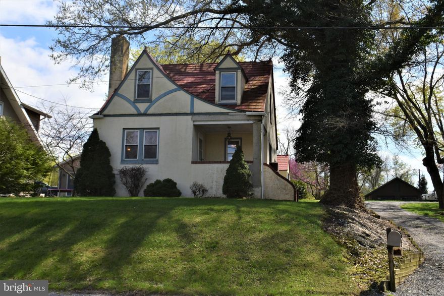 Great for a first-time homebuyer or someone looking to downsize.  Two-bed, one-bath Tudor cottage in quiet rural setting, yet convenient to Route 322, US-81 and a close commute to Harrisburg.  Freshly painted, new carpet, updated plumbing fixtures in bath, new toilet, new exhaust fan.  Pellet stove in the living room for supplemental heat.  Detached one-car garage.  Amazing stone wall and outdoor fireplace, great for outdoor entertaining or to relax and enjoy the peace and quiet. Move right in.  Schedule your showing today.