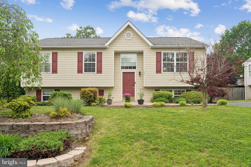 Buyers Change of heart is your buyers good luck! Welcome to your dream home! This stunning split foyer residence, built in 1999, offers a perfect blend of comfort and style, boasting 2,160 sq. ft. of well-designed living space. With 4 spacious bedrooms and 3 full bathrooms, this home is ideal for those seeking both functionality and elegance. Step inside to discover a warm and inviting interior featuring solid hardwood and luxury vinyl plank flooring, complemented by tasteful tile accents. The open-concept layout seamlessly connects the dining and living areas, enhanced by a cozy fireplace that creates a perfect ambiance for gatherings. The kitchen is a chef's delight, equipped with modern appliances including a built-in microwave, dishwasher, and refrigerator, along with a convenient pantry for all your storage needs. Outside, the property shines with extensive hardscape and beautiful landscaping, creating a serene outdoor oasis. Enjoy your morning coffee on the screened porch or relax on the patio while surrounded by the tranquility of mature trees and wooded views. The 0.29-acre lot offers ample space for outdoor activities and backs to lush greenery, ensuring privacy and a peaceful atmosphere. Additional features include a dedicated laundry area in the basement, ample parking with an asphalt driveway, and a handy shed for extra storage. This home is not just a place to live; it’s a lifestyle waiting to be embraced. Don’t miss the opportunity to make this beautiful property your own!