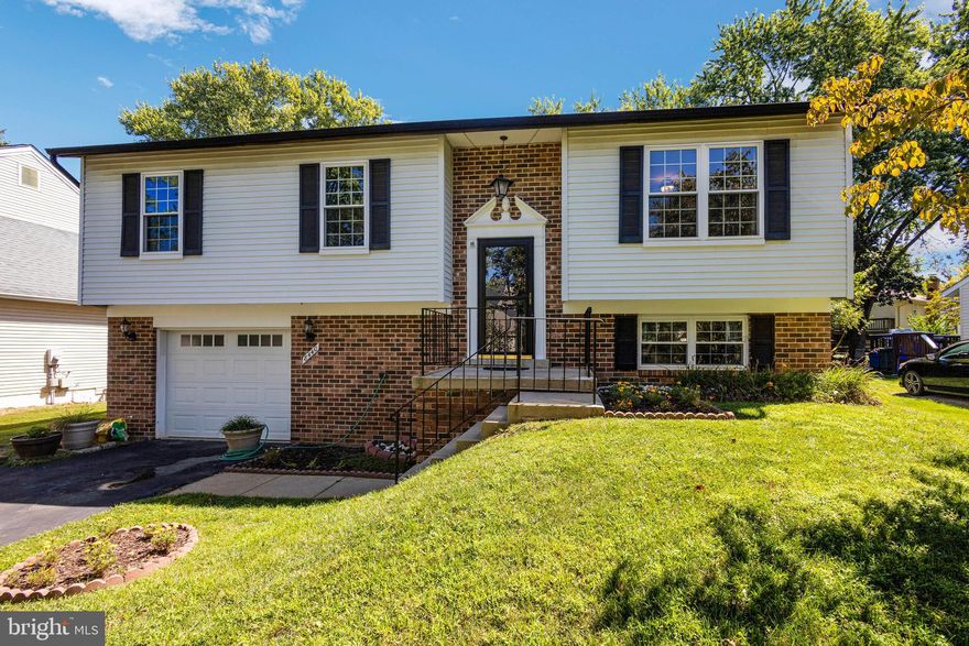 "Remarkable Upgraded Home in Flower Hill: This lovely split foyer home offers a blend of modern upgrades and charming features. Step into the remodeled kitchen boasting stainless steel appliances, granite countertops, newer cabinets, and ceramic flooring. The kitchen flows seamlessly into the beautiful family room/sunroom expansion, crowned with a cathedral ceiling to create a spacious and inviting atmosphere.

Entertaining is a joy with the large rec room featuring a wet bar and fireplace, while the sunny rear deck is a perfect spot for outdoor relaxation. The landscaped yard adds curb appeal, and the fenced backyard ensures privacy and security.

Upgrades in the last seven years include a new HVAC system, replacement windows, and a garage door. The convenience of being just 4 miles from the Metro station makes commuting a breeze, and the community amenities are sure to enhance your lifestyle.  Sought-after Magruder High School district.