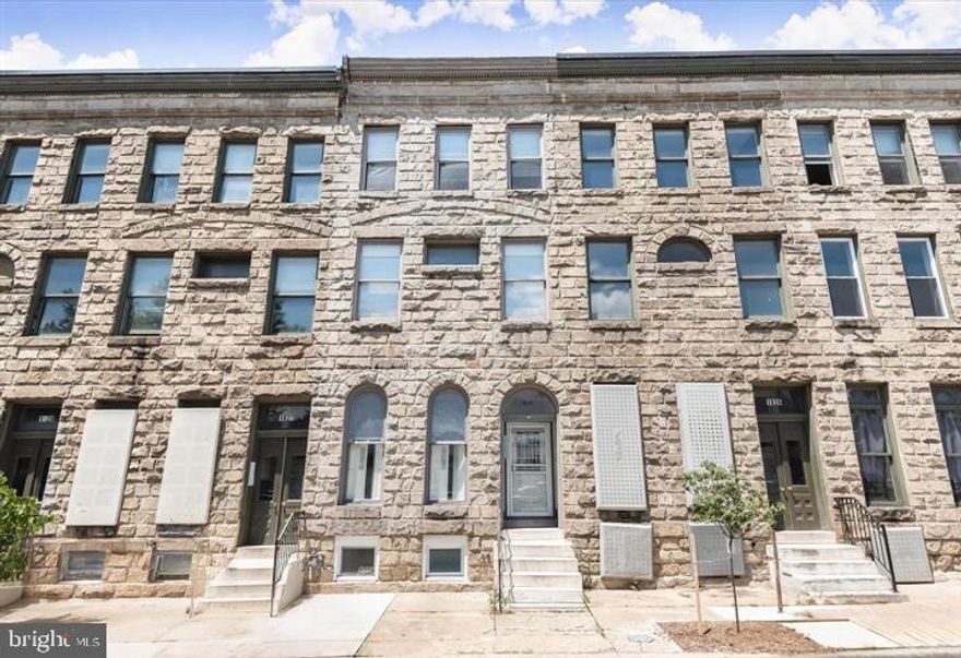 Triplex in Baltimore City that has been updated within the last few years. Four levels with two one-bedroom/one-bathroom units, and one two-bedroom/one-bathroom unit. Each of the three units have separate utility meters for their electricity, central air conditioning, and water heaters. Modern amenities and upgrades, exposed brick walls, tall ceilings and an abundance of natural light throughout make this an attractive building for tenants. Apartment #1 on the entry/first level is a one-bedroom/one-bathroom unit. Apartment #2 on the second level is another one-bedroom/one-bathroom unit. Apartment #3 on the top level is a two-bedroom/one-bathroom unit. The finished basement includes inside access with a bonus room that could be used for additional storage or could be converted back into a fourth unit for additional rental potential, with a full bathroom featuring a tub-shower. The common laundry room on this level has two sets of coin-operated washers and dryers, and a door outside to the rear with a one-car parking pad, accessible from the alley. Centrally located in the Charles North neighborhood of the Station North Arts and Entertainment District of Baltimore. Convenient for commuters, just a few blocks north of Penn Station with Amtrak and MARC trains, along with several Light Rail and bus stops nearby, and quick access to 83. Just several blocks away are The Maryland Institute College of Art (MICA) and The University of Baltimore, while Johns Hopkins University is just over a mile away. Currently, apartments 1 and 3 are vacant and apartment 2 is occupied. Owner pays for gas and electricity for the common areas and basement, while the tenants are responsible for their own apartments. The water bill is also split into thirds. Some images have been virtually staged. Short Sale - Being professionally negotiated.