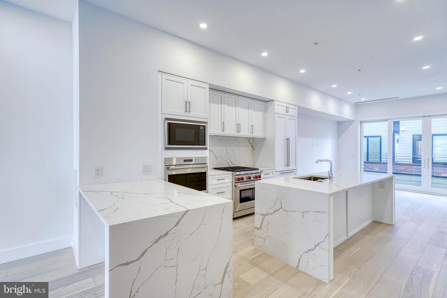 Fully Loaded home on a quiet street with SKYLINE views from ALL floors in the coveted Logan 23 development located in the Albert M. Greenfield School catchment in the 19103 zip code. Many upgrades available! Logan23 homes are Sensational new 4-story homes with 3-CAR GARAGES, GATED driveway, Tax abatement, 5-stop elevators, Smart-home systems (control 4), Roof-deck, three outdoor areas per home, and skyline views. FULL 10 year Tax Abatement approved!! This may be the last opportunity to purchase a home in 19103 with a FULL 10 year abatement. do not procrastinate!! Logan23 has the exact amenities everyone has been looking for. 8 homes located on quaint Croskey Street and 8 homes on 23rd Street starting at the corner of Cherry Street. This amazing development has a gated driveway and luxury finishes throughout. The kitchen comes with Sub-zero and WOLF appliances, Quartz counters with 2 cm eased edges and a ton of high-end cabinets. There is a large deck off the living room, perfect for entertaining and the BBQ. All of the bathrooms have designer vanities, amazing large format tile selections, and custom fixtures with super cool mirrors and lighting choices. The full floor master suite is to die for and includes walk in closets with custom shelving systems, a five piece bathroom with free standing oval tub, huge walk in shower with glass doors, body sprays and his and her hand held shower fixtures. The elevator takes you all the way to the jaw dropping roof deck, which has stunning views. There are no other homes on the market like LOGAN 23. Fantastic location steps away from the new FITLER CLUB, Philly's only lifestyle club with world-class restaurants & bars, a Field House, study and event spaces. Also steps above Rittenhouse and a half block from the Schuylkill river trail!! More amazing features of the LOGAN 23 homes include, full size laundry rooms with W/D included, designer staircases with metal handrails, multi zone heating and air systems, alarm systems, fireplace and motorized shades options, Kohler plumbing fixtures, LED recessed lights, gated driveway, and again, 3-CAR GARAGES! Construction is 98% complete, as the photos reflect. The Croskey Street homes are identical to the 23rd street homes. There are only two corner homes available! This home is currently set up as a 3 bedroom, but a fourth bedroom can be added. All square footage numbers are approximate and include above and below grade square footage. Square footage should be verified by the buyer. It is the responsibility of the buyer to verify real estate taxes. Taxes and condo fees are estimated.