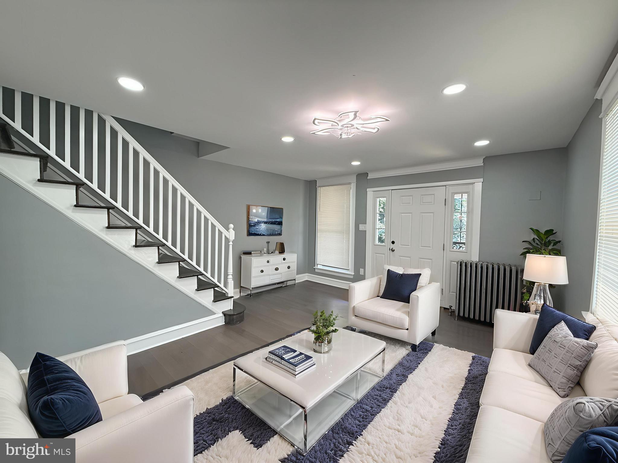 Location, Location, Location!!! RARE OPPORTUNITY to own this unique, beautiful & professionally remodeled large & spacious CORNER End-Unit Row home in Oxford Circle section of Northeast Philly! Take advantage of this opportunity before it's gone!
This property has recently been fully remodeled from top-to-bottom all throughout! This beautiful home boasts 4-5 bedrooms, 2 full bathrooms, rear 1-car driveway & spacious front porch and it welcomes you with a straight-through 1st floor open floor plan with beautiful hardwood floors throughout with lots of windows for plenty of natural lights to help save on energy! Enter into the large Living Room with LED ceiling fans, recessed lights & gleamy hardwood floors throughout to the Dining Room! Then you'll enter into the glamorous upgraded Kitchen with recessed lights & pendent lights above the granite kitchen island, granite countertop, an abundance of white cabinetry with stainless-steel cabinet hardware, large luxury tile backsplash, large & luxurious tile floors, and stainless steel appliances (includes Refrigerator, Stove/Range, Built-in Microwave, Range Hood & Dishwasher). 2nd Floor features 3 very spacious bedrooms with beautiful hardwood floors all throughout with ample closets, very nice LED ceiling fans, and recessed lights! Hallway Full Bathroom on 2nd Floor is another luxurious upgrade that consists of a nice single vanity, toilet, spacious walk-in shower with sliding glass doors & large luxury tile walls, large luxury tile floors, exhaust fan, & recessed lights!
Basement is fully finished and features a laundry room, 2 bedrooms, 2nd kitchen, & modernized full bathroom! Entire finished basement has tile floors all throughout. Basement Bathroom consists of a single vanity, medicine cabinet with mirrors, subway tile backsplash, toilet, and a spacious stand-up shower with nice luxury tile walls & beautiful sliding glass doors! Basement Kitchen has granite countertop, tile floors, subway tile backsplash, electric stove/range, range hood, white cabinetry & recessed lights! There are 2 bonus rooms that can be used as 2 bedrooms or 1 living room and 1 bedroom.
Entire property was fully remodeled in 2025! You'll want to check this home out in person to appreciate every little details that it has to offer! This home is a very low-maintenance property for the next Homeowner or investor! 1st & 2nd Floors can be used as 1 family, and fully finished basement may be used as another living space for like an in-law suite. Rents around this area are about $1,800-2,000/month!!! Why rent when you can own this home for much less than the rents around the area? Property is being sold strictly in AS-IS, WHERE-IS Condition. Septa bus / trolley stops & public transportation are easily accessible in the area! Walkscore is 86, which is very close to many amenities!!! Close to shopping mall, shopping centers, supermarkets, stores, gyms, restaurants, parks and minutes from Roosevelt Mall, Target, K-Pot Korean BBQ & Hot Pot, Five Below, & many more! Easy access to all major highways! Short distance to downtown Philadelphia, Center City, Penns Landing, & many more! PRICED VERY COMPETITIVELY TO SELL!! GREAT for First-Time Homebuyer or Investor! Get an offer in quickly before it's gone! Available mortgage financing w/ very low down payment & potential lender's grant up to $7,000!!! Limited Time Offer Only!!! Ask me how! ***INCLUDES 1-YEAR American Home Shield HOME WARRANTY