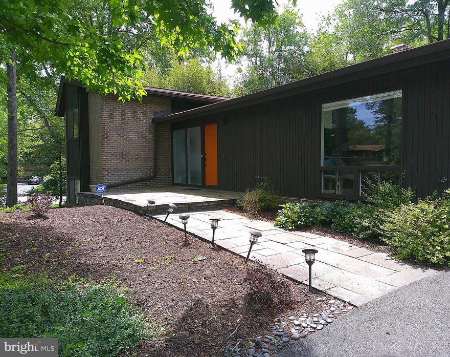 This stunning contemporary home, nestled in the highly desirable Wessynton community, offers an exceptional living experience and includes a private pool, tennis, and basketball courts, and boat launch. The main living area is bathed in natural light from large picture windows and features a unique two-sided gas brick fireplace that subtly divides the living and dining rooms. Solid hardwood flooring extends throughout the home.
Kitchen and Bedrooms: The kitchen is a chef's delight, boasting granite countertops, a breakfast bar peninsula, and stainless steel, and slate appliances. The upper level features three bedrooms, including a beautiful owner's suite. This private retreat offers large picture windows with serene views of the surrounding woods, creating a comfortable, forested oasis. The two additional upstairs bedrooms are bright and airy, each with ample closet space and ceiling fans.
Lower Level and Outdoor Features: The finished lower level expands the home's living space with several inviting areas. You'll find an awesome den with a curved, wood-paneled ceiling, a fourth bedroom, a full bathroom, and a convenient utility room. Outside, the large flagstone patio is perfect for relaxing or hosting cookouts. An oversized two-car garage with convenient side garden access completes the property.
Community and Location: The Wessynton neighborhood is a true gem, featuring 156 contemporary homes set amidst natural surroundings near the Mount Vernon Estate. Residents enjoy an extremely active social committee that organizes a wide range of year-round activities for all ages. The home's prime location offers easy access to the Mount Vernon Multi-Use Trail and the diverse shopping and dining options of Old Town Alexandria.
-Extra Freezer and Wall Mount TV in Kitchen Convey (as is)-Rent Includes Seasonal Grass Mowing, Rear Yard Clean-up, and Annual Mulching.
Managed by Promax Management, a professional property management company- No smoking-1 Dog considered case by case (No Cats)- Maximum 2 unrelated adults -Application fee of $65.95 and earnest money deposit check(s) made payable to Promax Management Inc- The Landlord prefers a credit score of 675 or higher however, all scores will be considered and minimum rent-to-income ratio of at least 33%--