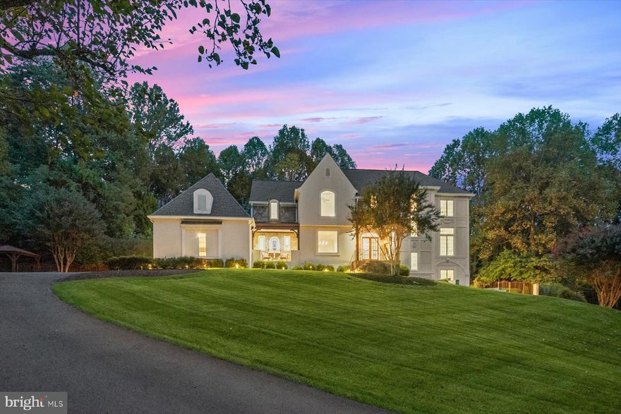 Perched on a hill at the end of a quiet cul-de-sac, this stately residence makes an unforgettable first impression. Completely renovated from top to bottom, the home blends timeless architecture with today’s most desirable features and finishes.
Sited on nearly two acres, this property showcases a stunning pool, outdoor kitchen and patio, and ample yard space.  Inside, the home offers 5 spacious bedrooms and 4.5 luxurious bathrooms, designed for comfort and flexibility.
The grand public rooms feature soaring ceilings, abundant natural light, and elegant details, creating a welcoming environment for both large-scale entertaining and everyday family living. At the heart of the home, the gourmet chef’s kitchen is outfitted with top-of-the-line appliances, custom cabinetry, and an oversized island perfect for gathering. Just off the kitchen, a two-car garage provides everyday convenience.
The primary suite is a true retreat, offering a spacious layout, serene views, and a spa-like bathroom with premium finishes. Additional bedrooms and baths provide plenty of space for family, guests, or home offices. The walkout lower level includes a large recreation room, a private bedroom and full bathroom. 
Every detail has been thoughtfully considered—from the flow of the living spaces to the high-end fixtures and finishes throughout. The combination of its stately presence, resort-style outdoor living, and complete renovation make this a truly rare offering. Fantastic location offers easy access to Washington DC, Dulles Airport, Tysons Corner,  495 and 66.