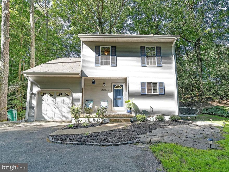 Tucked away at the end of a quiet cul-de-sac, 23295 White Elm Court feels like home the moment you arrive. Set on a spacious third-acre lot in the heart of Wildewood, this charming two-story residence offers the perfect balance of comfort, space, and everyday livability.

With over 2,100 square feet of living space and three bathrooms, the layout is designed to give everyone room to spread out while still feeling connected. Cozy up by the fireplace on cooler evenings, or step outside to the expansive wood deck—an ideal spot for morning coffee, summer gatherings, or simply enjoying the peaceful surroundings.

The open front porch welcomes you in, while the attached garage adds convenience to daily life. Surrounded by mature landscaping and located in an established neighborhood, this home offers a sense of privacy while remaining close to shopping, dining, and local amenities.

Whether you’re hosting friends, relaxing at home, or enjoying the calm of cul-de-sac living, White Elm Court delivers the lifestyle buyers are searching for—comfortable, quiet, and effortlessly inviting.