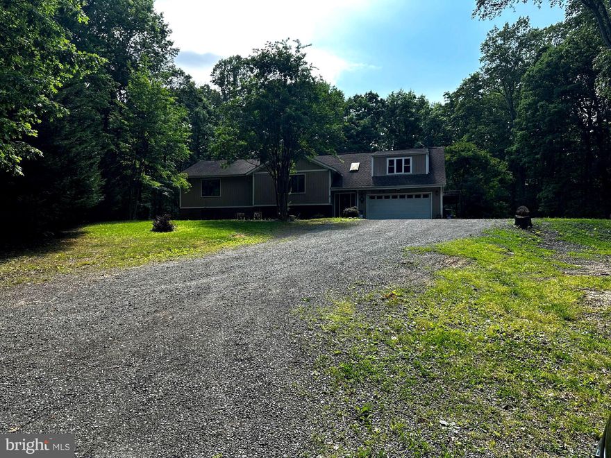 NO HOA!!!!

Beautifully secluded home on 4.01 acres, Large open floor plan with two stories. Two pellet stoves to extra heat in the winter. Formal living and dining room on main level with a amazing sunroom that opens to a deck and overlooks the inground pool. Basement is finished with wet bar, den, pool room, and bedroom. Big two car garage with finished walls and wired for 220. Master suite with his and her dressing rooms. Video cameras in use inside & out.

Schedule showings through Showtime,  Sentrilock box at front door