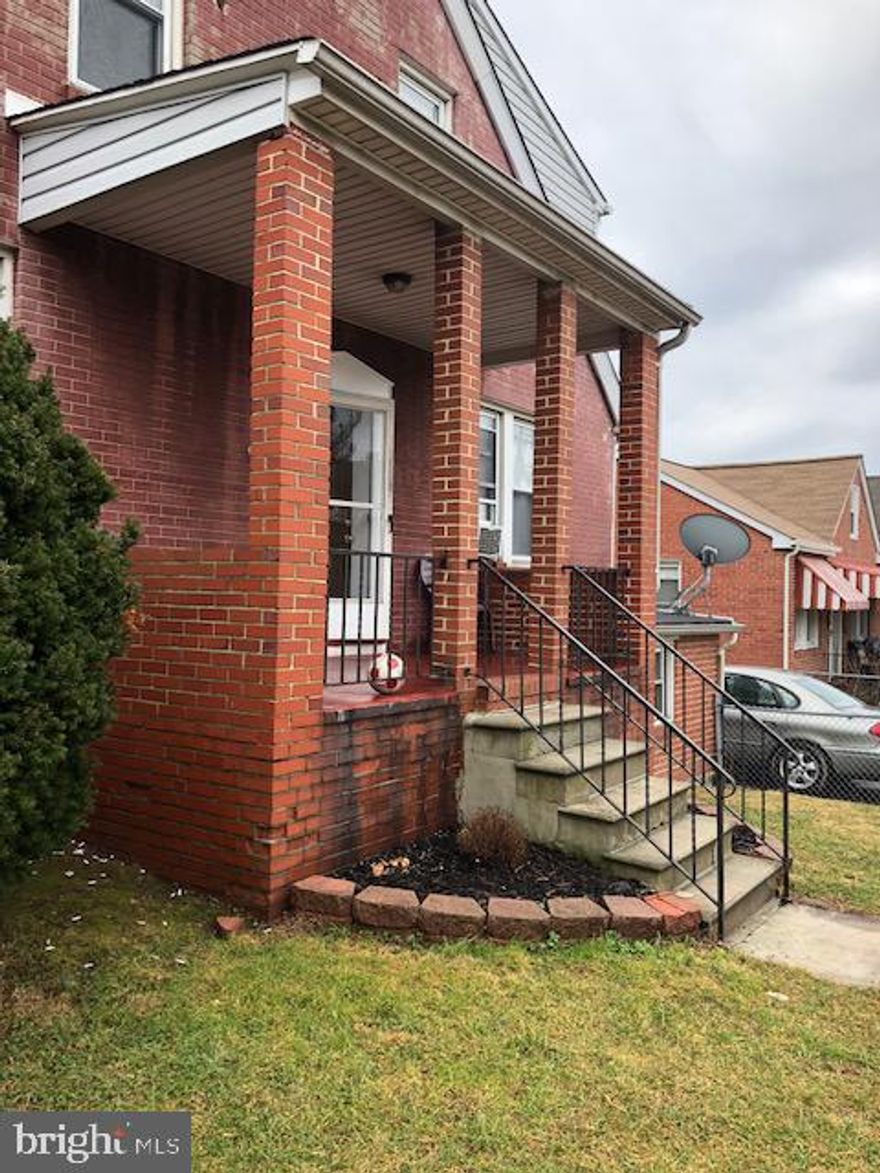 Freshly painted 2 bedroom 1 bathroom first floor apartment featuring stove and refrigerator, hardwood floors, ceiling fans washer and dryer located in common area. Great location with lots of yard space and intercom system to view your guess and buzz them in.