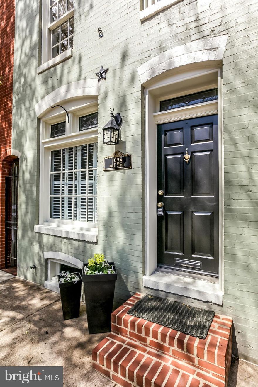 Must see the beautiful home, well-designed floor plan with separate living and dining rooms, decorative fireplace in the dining room, galley kitchen, large bedroom with adjoining den/office and full bath on the 2nd floor, 3rd floor master suite/retreat with abundant closet space as well as hardwood floors throughout and a roof top deck with amazing views!