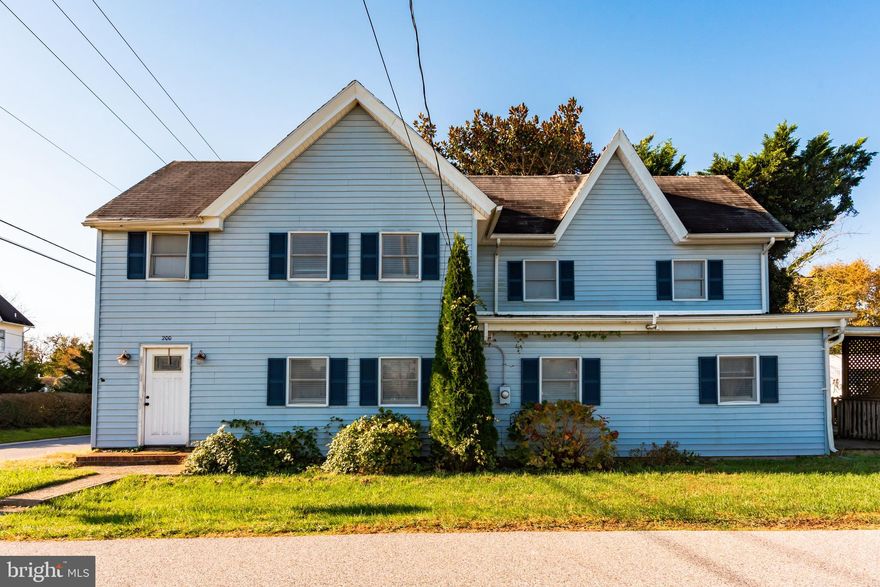 PRICE REDUCED!  Seller says "bring all offers"!  Fantastic home located in downtown Berlin! Short walk to historic Main Street!  4 bedrooms, 2.5 baths plus bonus room! Recently remodeled kitchen with butcher block counter tops, farmhouse sink, custom lighting and stainless appliances.  Custom made barn door that separates dining room and living room area.  Large bathroom recently renovated.   Custom wood faux blinds throughout!  Fenced in yard! Rear deck! Great location close to everything that Berlin has to offer!  |Tons of possibilities for this huge home!  Don't miss this opportunity to own in downtown Berlin!