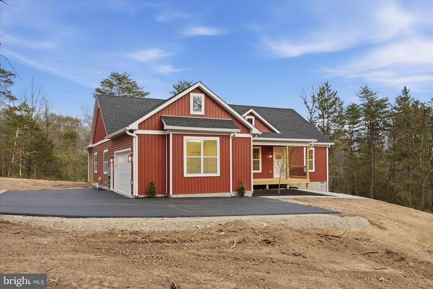 JUST COMPLETED! This New home on 2.5 private acres offering one-level living in a peaceful, tree-filled setting. This thoughtfully designed home features an open floor plan with 9-ft ceilings throughout, custom trim work, solid wood doors and luxury vinyl plank flooring throughout the entire home.
The spacious kitchen is a standout with quartz countertops, upgraded three-tone cabinetry, a large island, and pantry, perfect for entertaining or everyday living. Flexible space can be used as a formal dining room or home office.
All bedrooms are generously sized and include walk-in closets, while the bathrooms also feature quartz countertops for a cohesive, high-end finish.
Enjoy the outdoors from the covered front and back porches, surrounded by mature trees and a quiet setting. The insulated, painted, and finished garage includes a 16x8 garage door and adds extra functionality and comfort. A perfect blend of modern finishes, privacy, and convenience—this home is ready to impress.