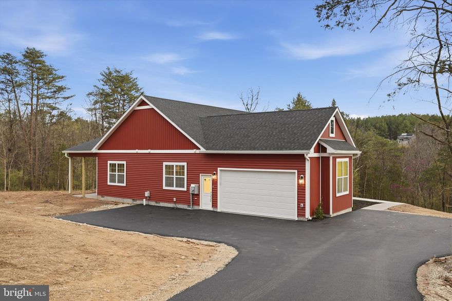 HUGE PRICE REDUCTION! Come check out this brand new house with no HOA, 2.5 PRIVATE acres offering one-level living in a peaceful, tree-filled setting. No future building to the right of the home provides extra privacy and open space plus NO HOA. This thoughtfully designed home features an open floor plan with 9-ft ceilings throughout, custom trim work, solid wood doors and luxury vinyl plank flooring throughout the entire home.
The spacious kitchen is a standout with quartz countertops, upgraded three-tone cabinetry, a large island, and pantry, perfect for entertaining or everyday living. Flexible space can be used as a formal dining room or home office.
All bedrooms are generously sized and include walk-in closets, while the bathrooms also feature quartz countertops for a cohesive, high-end finish.
Enjoy the outdoors from the covered front and back porches, surrounded by mature trees and a quiet setting. The insulated, painted, and finished garage includes a 16x8 garage door and adds extra functionality and comfort. A perfect blend of modern finishes, privacy, and convenience—this home is ready to impress.