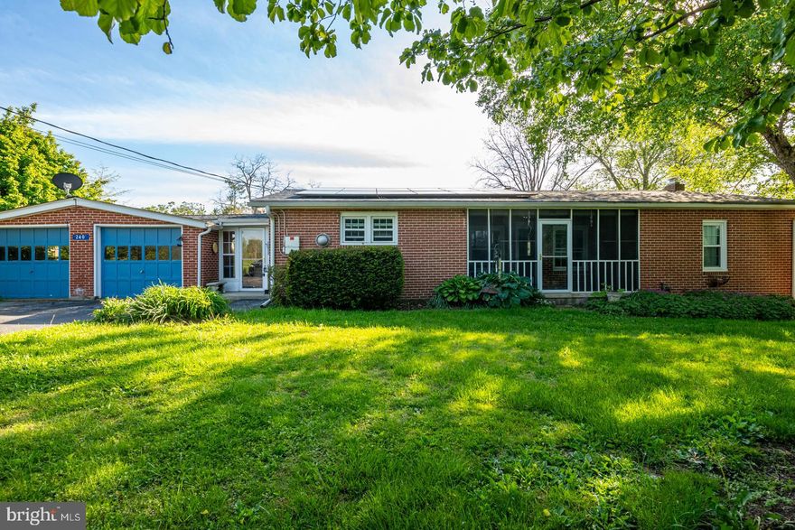 Have you ever dreamed about owning a place in the country where you could have horses, or goats, or chickens, a place where you could sit on your back deck and enjoy the view of lush, sprawling pastures?  Come take a look at 240 Oley Line Rd in Exeter Township.  This brick rancher on a low-traffic street has 3 bedrooms and 2 full, currently updated bathrooms with walk-in showers.  The eat-in kitchen has abundant cabinet space and a peninsula to make serving food for those family gatherings a breeze.  It has a built-in oven, a ceiling fan, and all the appliances remain.  The large living room opens onto a gorgeous newer deck with a view of the fenced riding ring and all the activity of those animals you always dreamed of having.  When you head into the basement, expecting “just” a basement, you will be pleasantly surprised to see a great bar, a wood-burning stove, and a washer and dryer which remain.  The attached 2 car, front-entry garage can be accessed from the mud room that runs between the garage and the house, which is so convenient and allows that buffer between the weather and entry to the kitchen.  The house has tiffany-style lamps throughout, hardwoods, replacement windows, newer solar panels, lush natural landscaping with mature trees, a wide driveway that provides additional parking spaces, a chicken coup, shed, 3 horse stalls, a 2023 Lennox heater, Speed Queen washer, Hotpoint dryer, a Hydrojet hot water heater, and a Bradford Woodstove.  This home was dearly loved by its owner; it was her dream home.  Maybe it’s time to make your dream come true too.