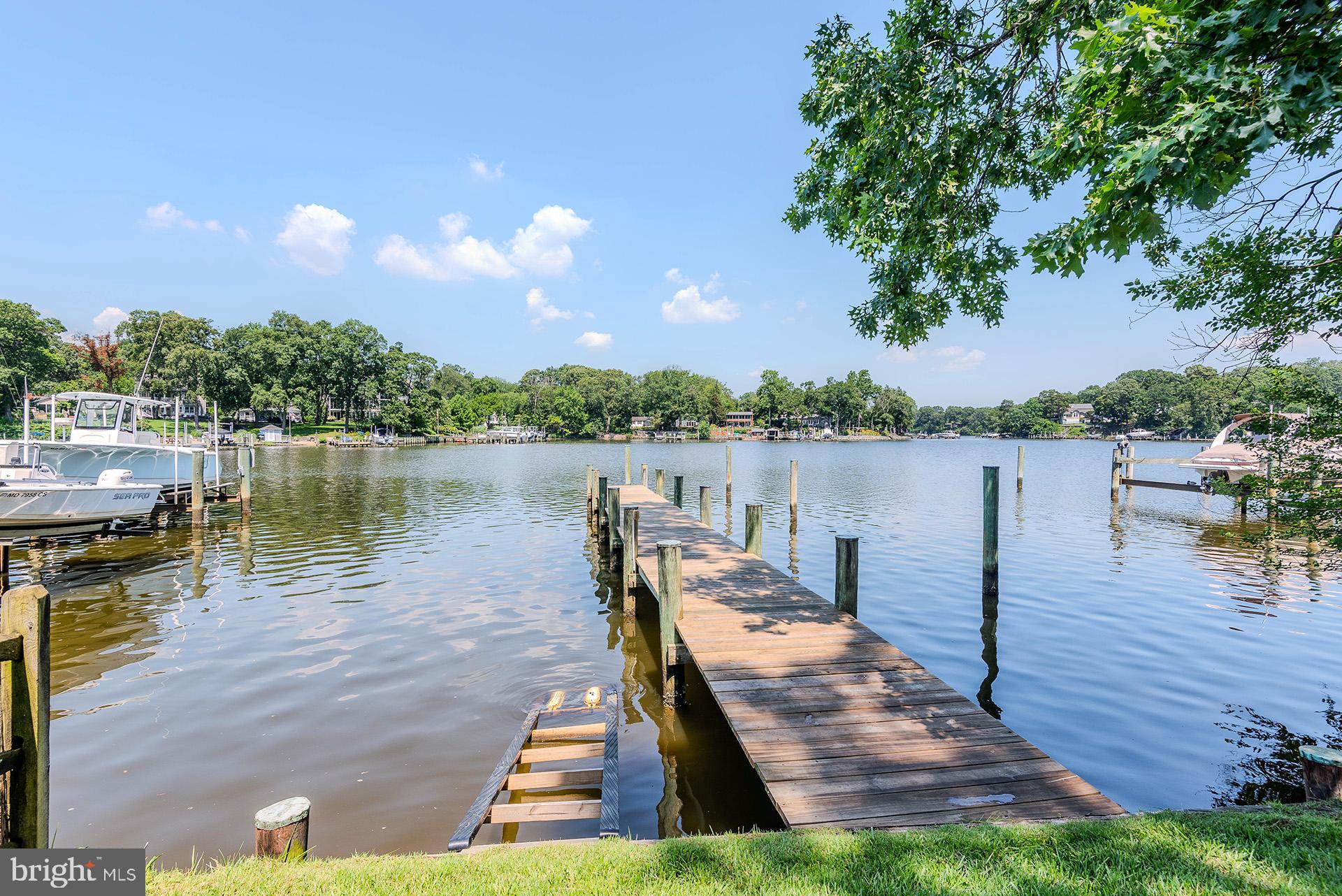 Welcome to 242 Beachwood Rd located on the magothy river. This amazing 2-bedroom 2 bath remodeled rancher features 2 generous size bedrooms large eat in kitchen stainless appliances quartz counter tops wine fridge and so much more, New LVP flooring and paint. Step outside to the large, covered deck overlooking private dock with deep water slip, Great for crabbing and fishing, leave your dock, and you can take your boat to 2 local waterfront restaurants within minutes also just a short ride to the Bay and downtown Annapolis or eastern shore. This home has it all summer has just started plenty of time to move in and enjoy this waterfront retreat. Call L/A with any questions Pets case by case