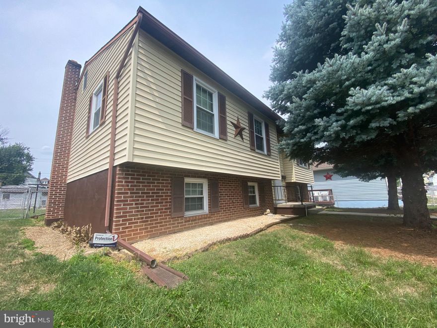 Single detached house with a very nice fenced yard and 6 off street parking spaces.  large shed for storage.  You will enjoy sitting on your covered porch.  2 large living spaces. 1 upstairs and 1 on the lower level.  Lower level family room has a hearth  for a wood or pellet stove.  Kitchen opens to dining and family room.   4 new mini splits for air conditioning and heating.  New half bath in the basement. Also, plenty of storage in the unfinished area of the basement.