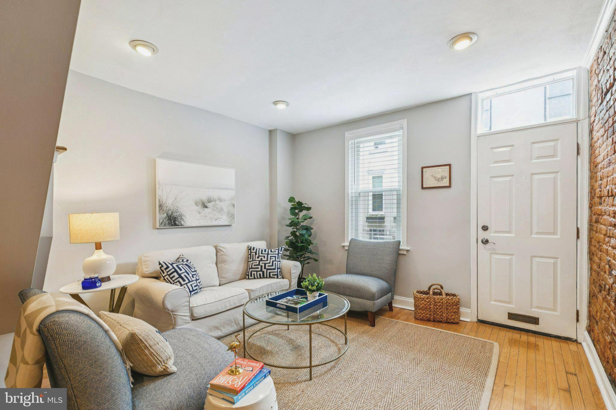 TWILIGHT OPEN HOUSE, THURSDAY ,9/11 from 5 to 6:30 PM. Amazing 5.25% interest rate on qualified Buyers 1st year mortgage, contact the listing agent for details**. Updated and move-in ready, charming 2 bedroom home on a quiet, picture perfect block in the heart of Fairmount is now available. Enter into the open living and dining rooms with warm hardwood floors, floor to ceiling exposed red brick and an extra large coat closet that can double as additional storage. Just beyond is a big eat-in kitchen with a brand new stainless steel appliance package complimented by solid stone counter tops and ceramic tile flooring. From here you'll access the private rear patio with planting beds and an elegant Japanese maple tree. Second floor offers a sizable Primary Bedroom with 3 closets and a cozy window seat w/storage bench, as well as, room for a king sized bed and additional seating area. Front Bedroom, currently set as an office, gets great natural light and has ample closet space and also a conveniently placed laundry closet. The bright full bathroom with ceramic tile floor completes this level. Natural light abounds with 3 strategically placed sky lights, one in the open stairwell & bathroom and the 3rd in the Primary Bedroom. Located in the Bache-Martin School catchment area and close to neighborhood favorites like the new Stephen's Cafe, Black Taxi, Musette French Coffee & Cafe and all the curated shopping, retail & restaurants Fairmount Ave. has to offer. And a few blocks away is Whole Foods, Target, Phila Art Museum, Kelly Drive and more.