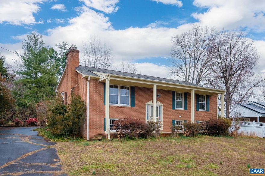 OPEN SUNDAY 3/10 1-3PM Well built home in a fabulous Charlottesville location! Wonderful neighborhood with quiet, wide streets just minutes to downtown, this home is exactly where you want to be! Boasting beautiful hardwood floors, four large bedrooms, a private backyard off of the spacious kitchen with attached dining room, large family room with a fireplace in the basement, this home is ready for your personal touch! High quality roof installed in 2019 and freshly painted in 2023. Low maintenance brick exterior with a 12' wide rear deck. Home is comfortably conditioned with 2-3 window unit air conditioners, 2 are available to convey.,Fireplace in Family Room,Fireplace in Living Room