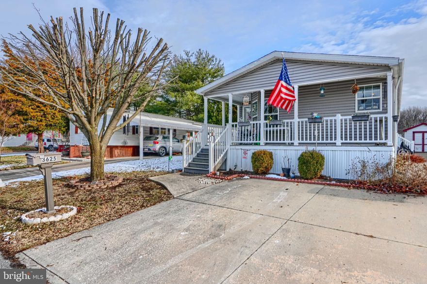 Welcome to Williams Estates in Middle River.! This three bedroom, two bath home has the perfect blend of comfort, convenience, and affordability. Relax on the cozy covered front porch on warm summer nights. Entertaining is easy in this open concept living room/dining room. The eat-in kitchen includes stainless steel appliances, lots of counter space with tons of storage The large primary bedroom boasts a walk-in closet and an en suite which includes a double sink and shower. Two other bedrooms share a hall bath. A laundry room with full size washer and dryer leads to side entrance with an outdoor shed. Neutral colors throughout. The community includes a playground, dog park, fitness center and more. Conveniently located to I-95 and I-695 makes travel quick to work, recreation and local attractions. All buyers must be park approved. Ground rent is currently $1002 a month.