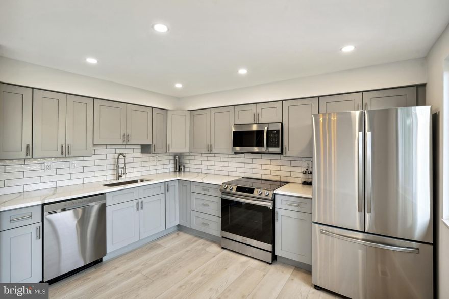 RUN !  DON'T WALK to this TOTALLY RENOVATED Brick-BEAUTY ! Quartz * Custom Ceramics * Wide-Plank Floorings * FOUR BEDROOM / 3.5 BEAUTIFUL Luxury BATHS * Open-Concept, Light-Filled END-UNIT, Ready for YOU ! NEW WINDOWS 2023 * NEW ROOF 2020 * NEW Water-Heater 2023* ALL-NEW Gourmet KITCHEN ALL-NEW Stnlss-Stl SAMSUNG Appliances ( Granite/Quartz/Stnlss-Stl, ) w/Custom Exhaust to OUTSIDE "To-Die-For ! *Specialty Recessed Lighting abounds ! ALL-NEW PAINT & HIGH-QUALITY Floorings ! * Oh my Goodness ! WALK-OUT Lower-Lvl w/3rd Custom BATH & 4th Bedroom/EXERCISE Room to Fenced Court-Yard * Lwr-Lvl offers OFFICE Area too * TWO FULL Custom Baths UPSTAIRS ! Primary-Suite Walk-In Closet plus All-New Private-Bath w/Pocket-Door * SUPER Community Great for Family & Friends * Stroll to Play-Ground *HUGE TREX  DECK to Entertain, Dining-Area SLIDERS to DECK ! Low HOA fee * NO CPRA !  Shop WEGMAN'S/Theatre/ Enjoy Columbia playgrounds, trails, picnic areas with grills, community tennis and sand volleyball courts. HCLS and STEM  Education Center nearby. Commuter routes including US-29, I-95, MD-100, and MD-32 offer convenient access to Washington DC, Silver Spring, Baltimore, & downtown Columbia Mall, Lakefront, Merriweather Post Pavilion *Timbers at Troy Golf Course, Rockburn Branch Park and Blandair Park for shopping, dining, and entertainment. Additional local outdoor recreation for boating, kayaking, and more. This fantastic home won’t last! HOA fee $58/Month NO CPRA FEE * COME & GET IT !