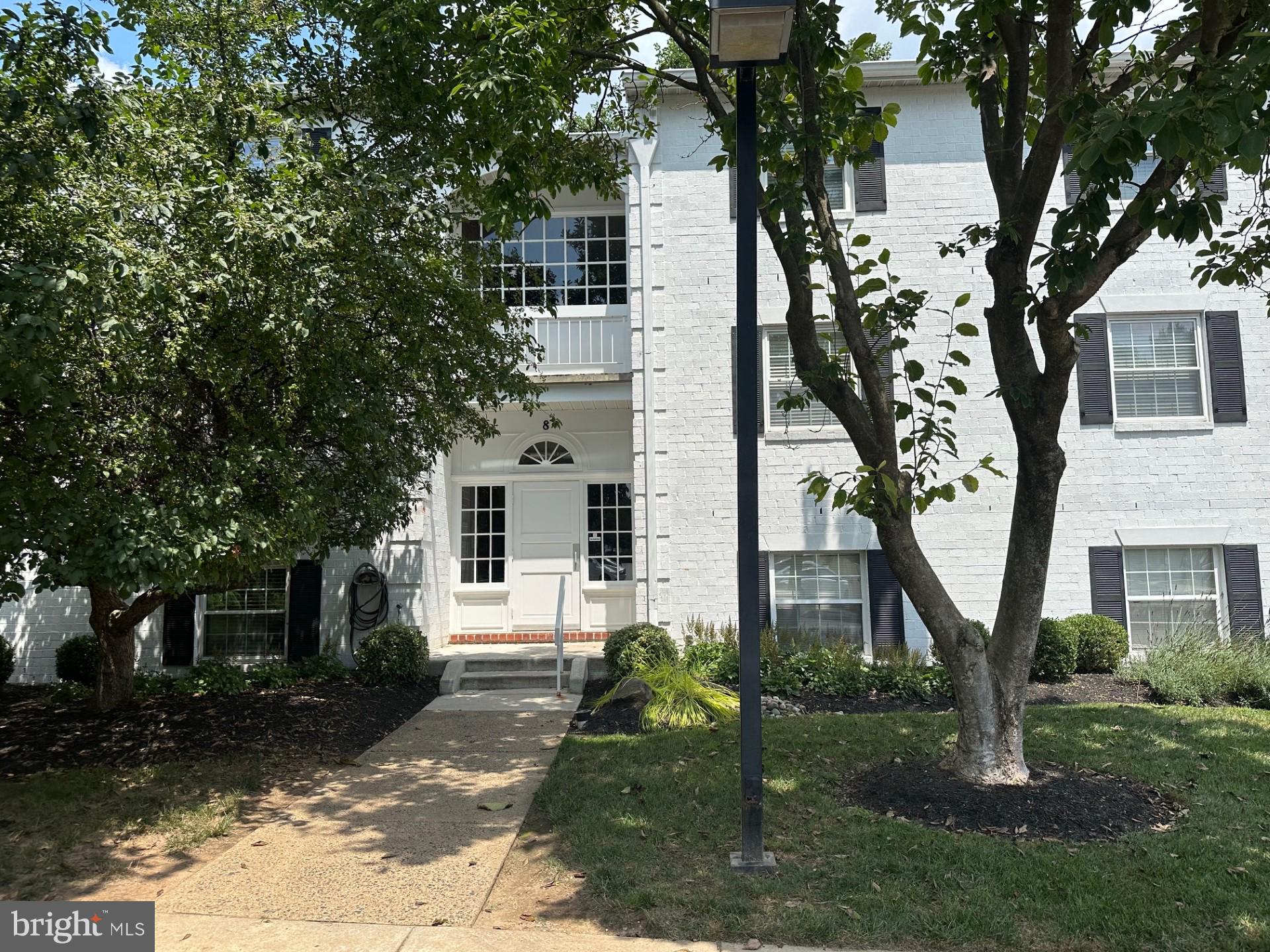 Updated with Wood Floors, Crown Moldings, Granite in the Kitchen & Baths, Custom Blinds, Ceiling Fans, New Washer & Dryer, New Sliding Glass Door.