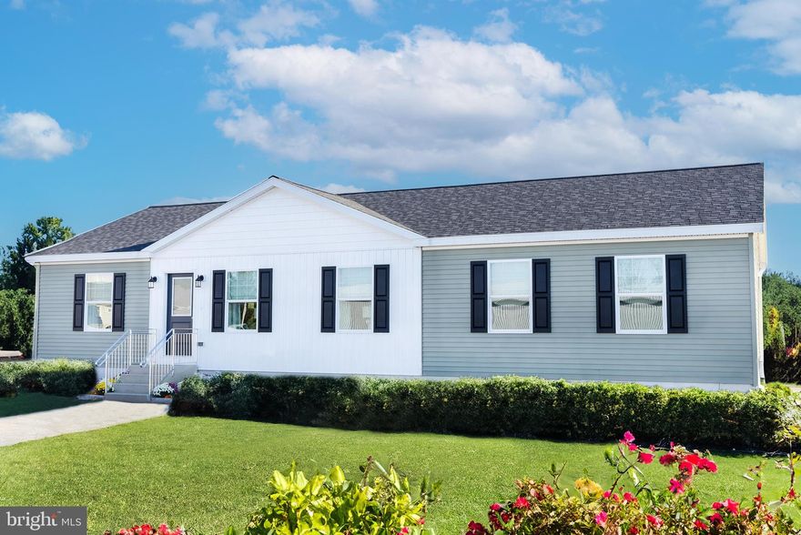 Welcome to The Lafayette! With 1,527 sq ft of living space, this 3 bedroom, 2 bathroom home offers ample space for family and guests. The primary bedroom has a spacious en-suite bathroom with a corner walk-in closet, double sink, stall shower and separate toilet room. The living space offers an open concept kitchen, dining area and oversized living room. You also have the option to upgrade to the 1,740 sq ft plan. Make your dream a reality & start enjoying all that Captain's Cove has to offer. Features include indoor & outdoor pools, a restaurant, banquette rooms, fitness center, basketball & tennis courts, boat launch, playground, security and so much more! All included in the HOA! Home is to be built and the photos of the model home may include options. Taxes are based on the land only.