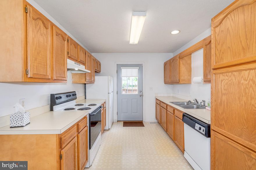 Welcome to this 3-bedroom, 2-bathroom rancher nestled in a peaceful neighborhood. This home features a new roof in 2014, a new water heater in 2022, a master bedroom bath with a whirlpool tub, a fenced back yard, a garage with remote opener, shelving and storage space, a front porch, and no HOA. The fenced back yard is ready for your landscaping ideas or outdoor activities. This is an ideal starter home or investment property. Conveniently located near public amenities, interstate highway, schools, and the Martinsburg Train Station. This home offers both tranquility and accessibility. Don't miss out on the chance to make it yours.