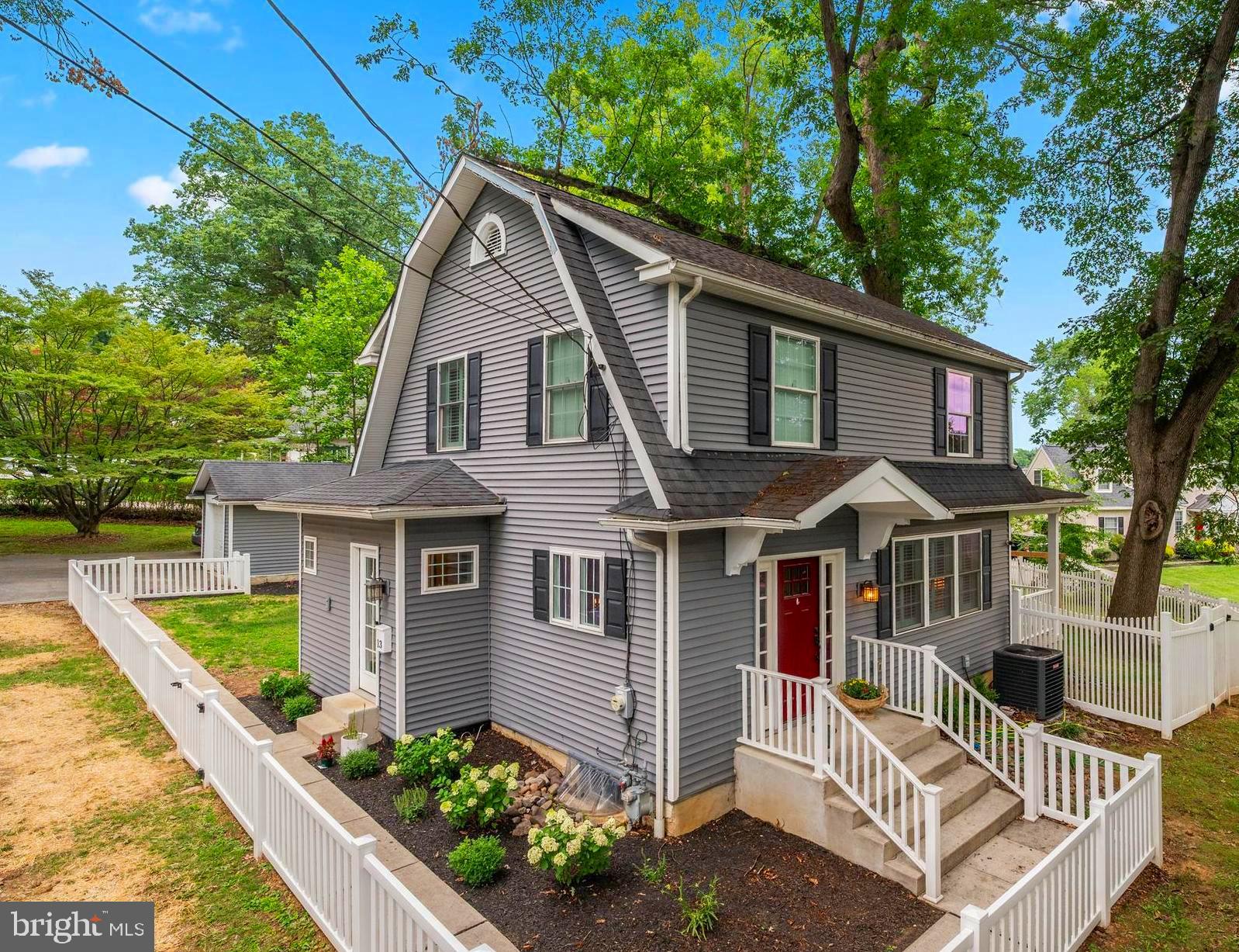 Welcome to 13 Frazer Ave in the heart of Malvern. This beautifully updated colonial, originally renovated in 2015 and thoughtfully enhanced again in 2024, blends timeless charm with modern comforts. Ideally located within walking distance to the quaint town of Malvern and Green Tree Park, this home offers both convenience and character. Step through the front door to find rich ebony hardwood floors and neutral tones flowing throughout the entire home. The spacious family room is filled with natural light from picturesque windows featuring elegant plantation shutters. A side door leads to a charming covered porch running the full length of the home, perfect for morning coffee or easily enclosed for a home office, playroom, or sunroom. The dining area/breakfast room features sliding doors that open to a private patio & fenced-in yard, perfect for entertaining or relaxing outdoors. The updated eat-in kitchen boasts white cabinetry, stainless steel appliances, a custom tile backsplash, and an inviting island. Off the kitchen, you’ll find a mudroom area with laundry and a powder room, making daily living a breeze. Upstairs, the primary bedroom offers two generous closets, and two additional bedrooms share a fully renovated hall bath(2024). The unfinished lower level provides endless potential for extra living space. Additional highlights: Fully fenced-in yard for play, pets, and privacy(2025), New HVAC, light fixtures, washer, dryer, dishwasher, stair railing, and carpet (2024), new french drain system (2023).  Located in the award-winning Great Valley School District. Just minutes to downtown Paoli & Malvern, playgrounds, walking trails, and major commuter routes. The work is done, the location is ideal, now it’s your turn to enjoy it! Schedule your tour today and experience all that 13 Frazer Ave has to offer!